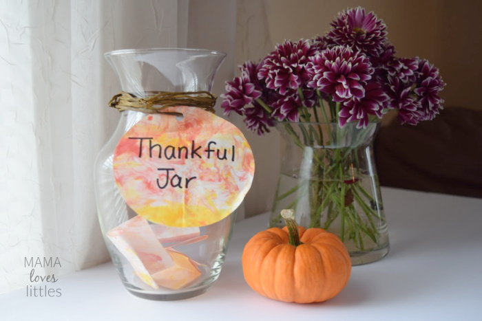 thankful jar activity with vase of flowers and pumpkin